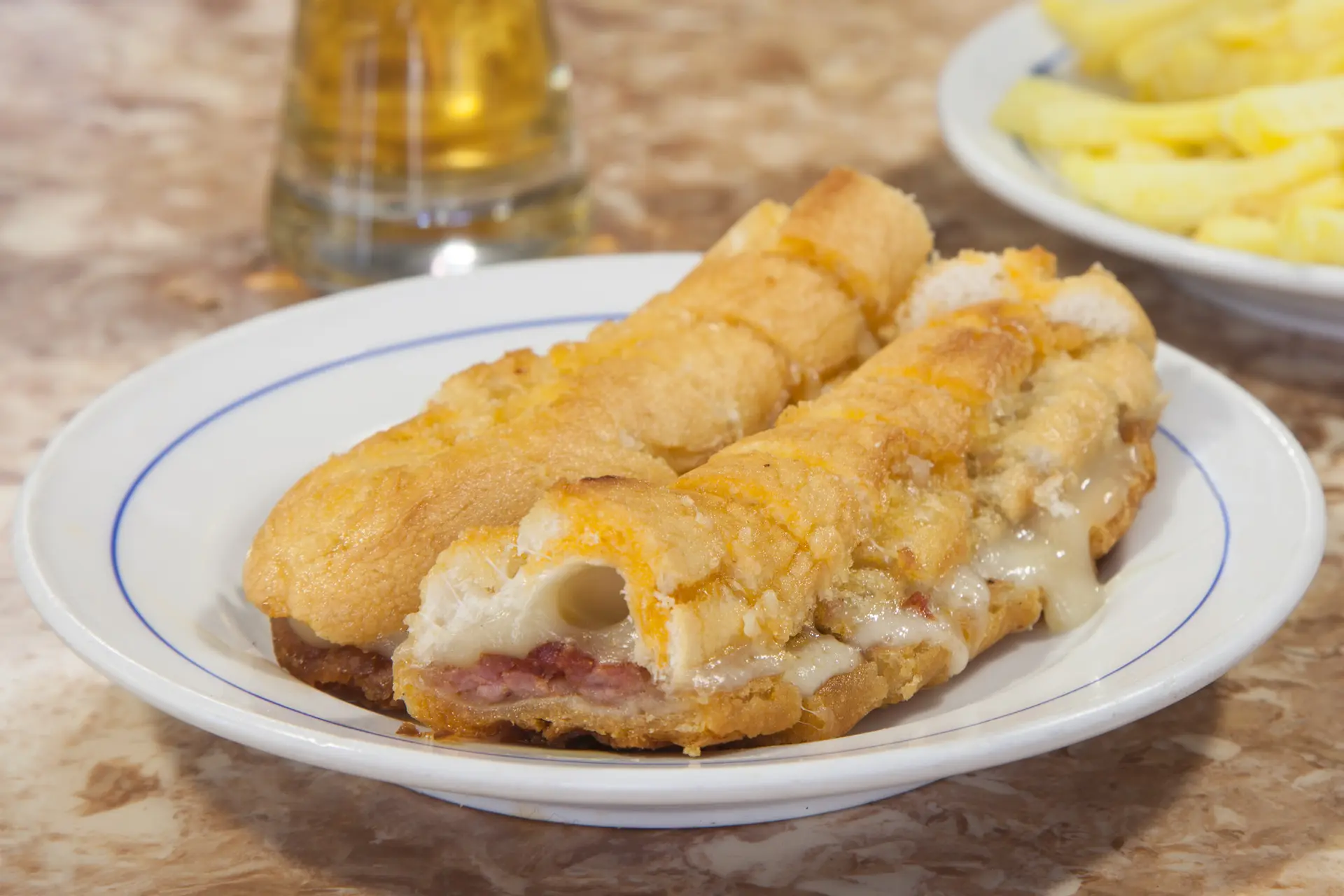 The famous spicy, pressed hot dog sandwiches at Gazela's.